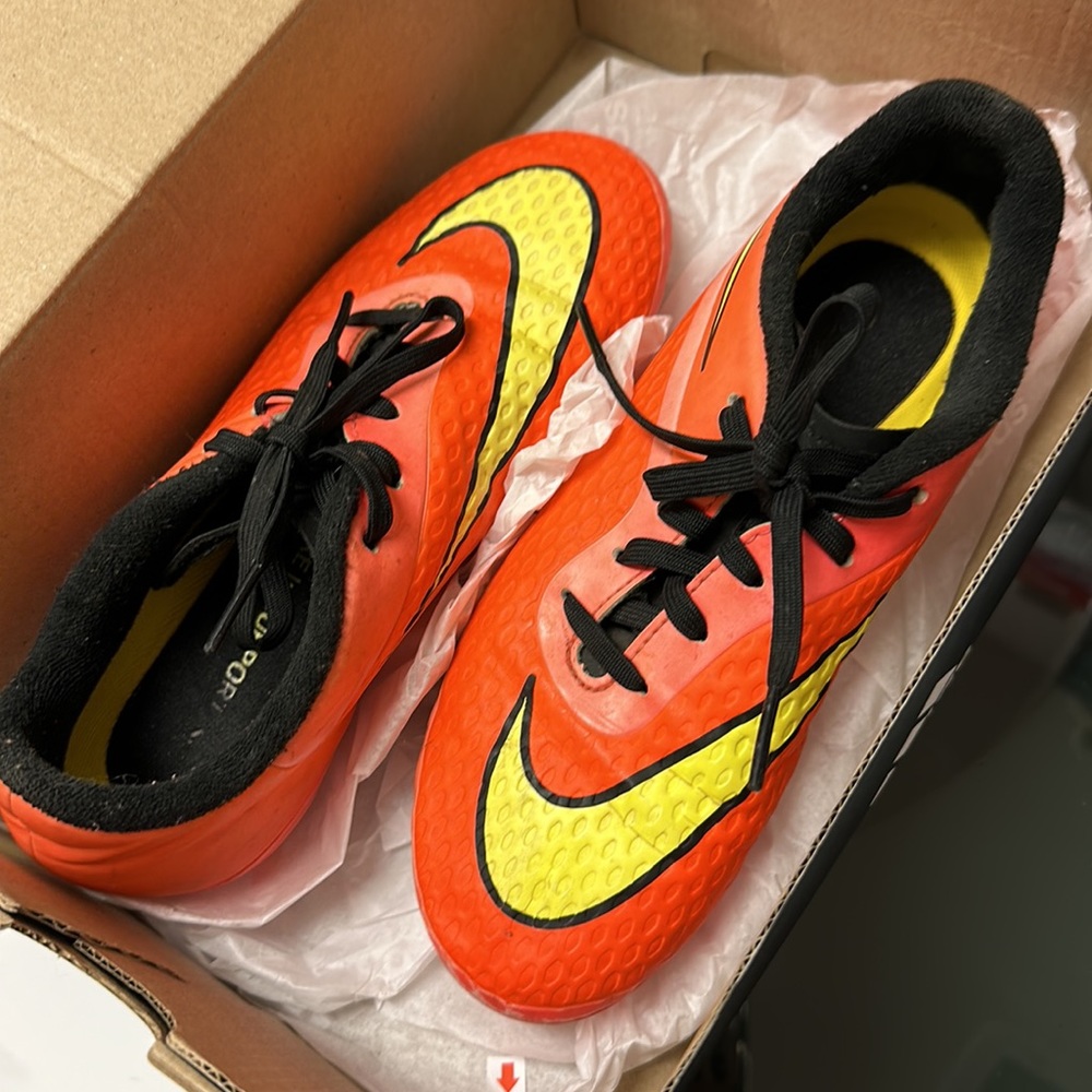 Red adidas soccer cleats